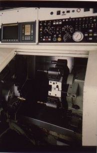 TAKISAWA CNC lathe with Ø 75 mm bar passage and turning up to Ø 300 mm